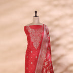 Detailed look at the matching deep crimson pure Banarasi silk dupatta, showcasing its luxury handwoven borders, premium drape, and heritage patterns.