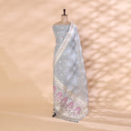 Detailed shot of the matching serene silver-blue organza silk dupatta highlighting its rich traditional handloom weave and intricate Zari detailing.