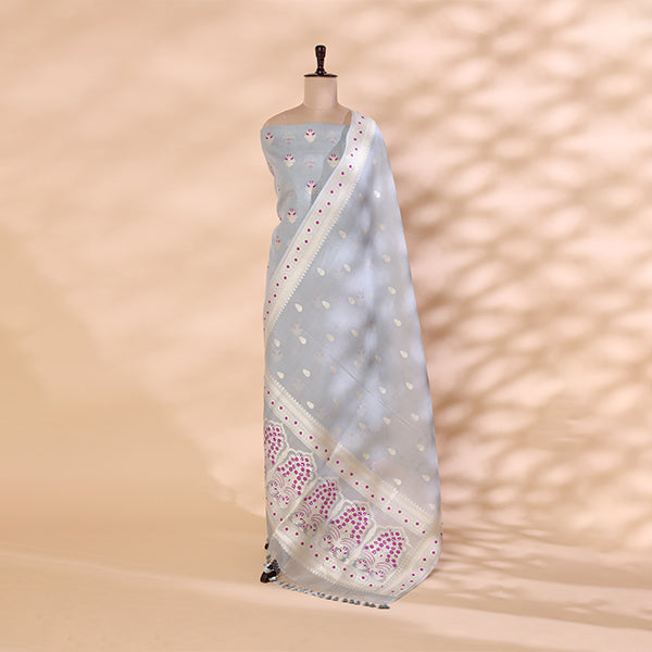 Detailed shot of the matching serene silver-blue organza silk dupatta highlighting its rich traditional handloom weave and intricate Zari detailing.