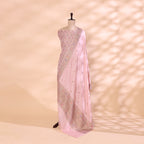 Handwoven misty fog-grey Munga Silk suit with an intricate gold Zari border and a vibrant multicolored rainbow tapestry dupatta displayed on a mannequin.
