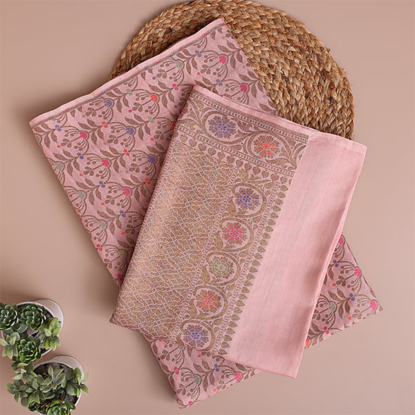 Close-up detail of the traditional handloom weaving, showing the intricate Zari and Resham work on the misty grey Munga Silk fabric.