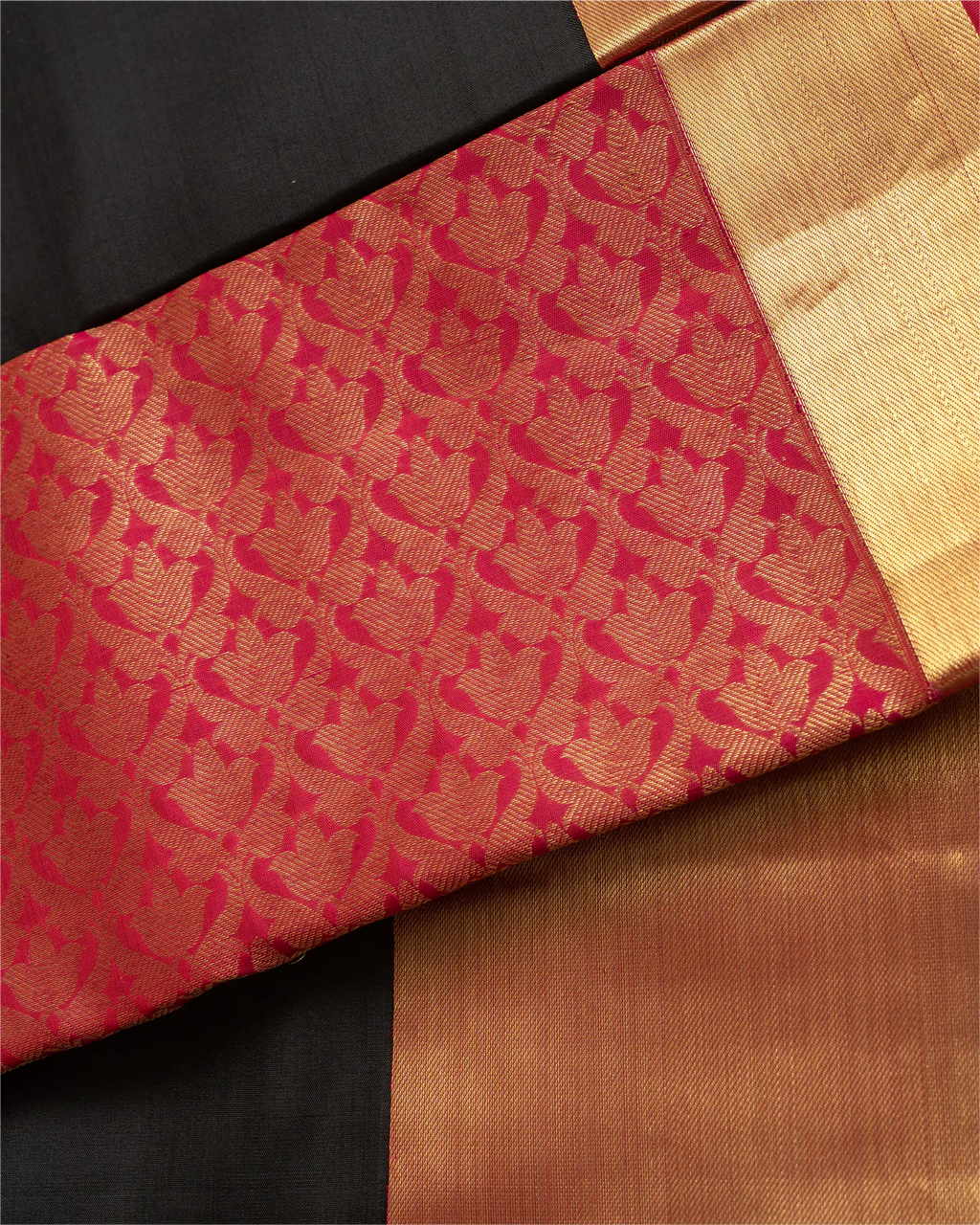 A woman wearing a premium Kanjivaram border silk saree, perfect for bridal and festive occasions.