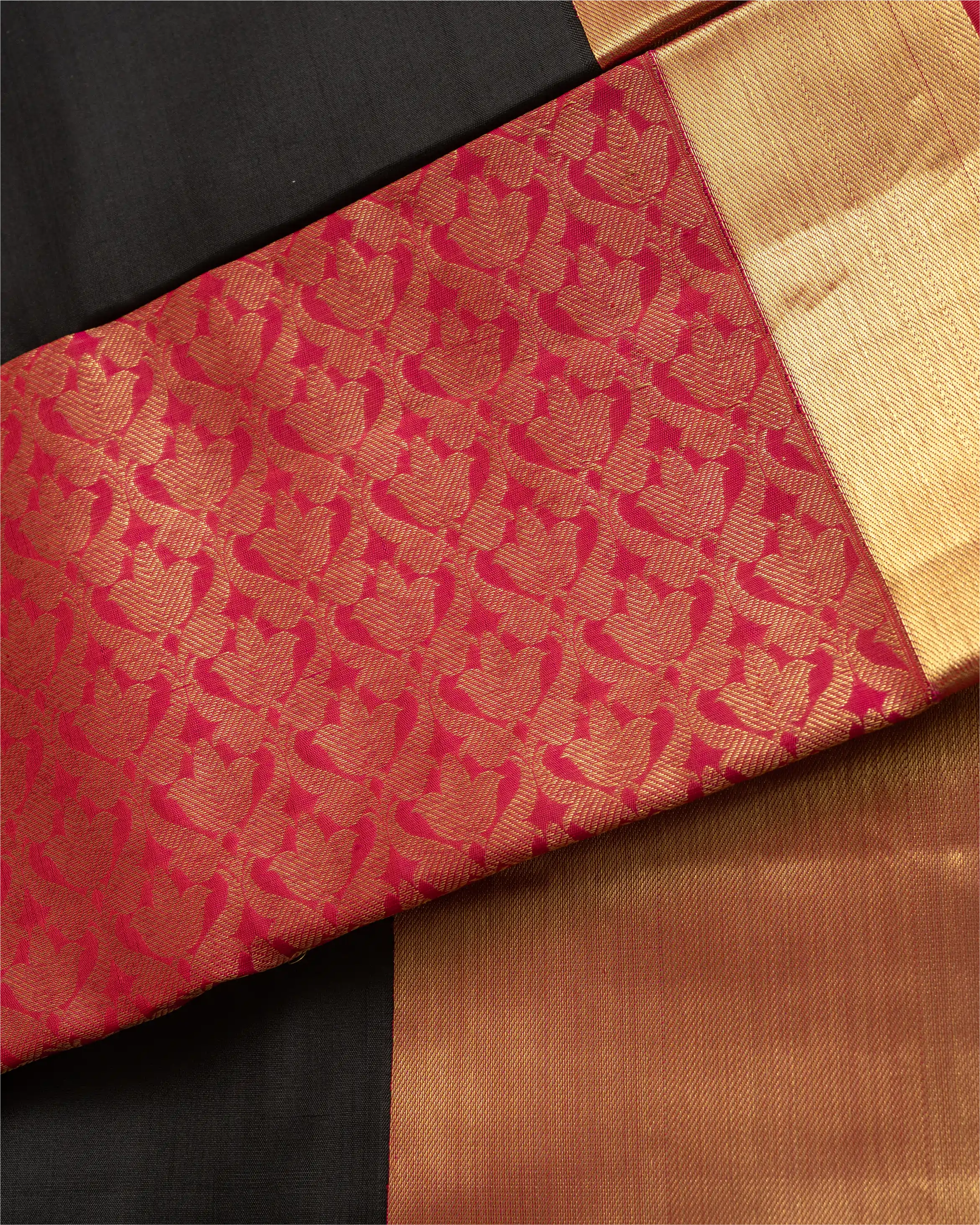 A woman wearing a premium Kanjivaram border silk saree, perfect for bridal and festive occasions.