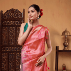 Close-up view of the striking pink and purple cross-color pallu and four-sided handwoven border on the Katan silk saree.