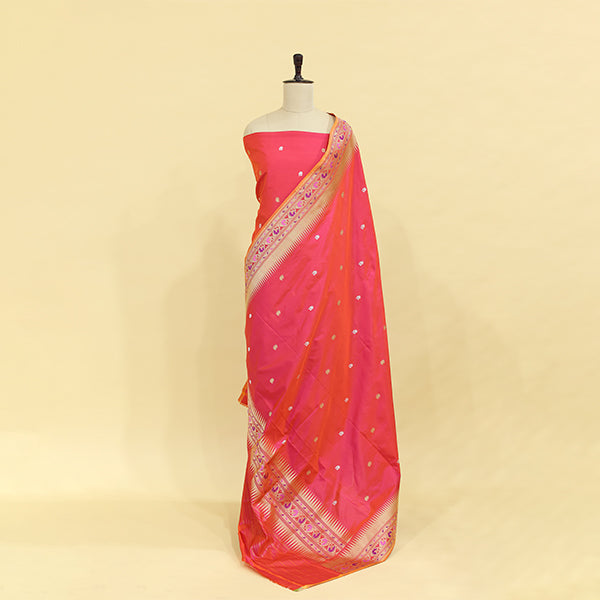Detailed view of the radiant multicolor Paithani border and zari work on the luxury unstitched silk suit dupatta.