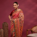 Close-up shot showing the intricate multicolored hand-woven Kantha embroidery work on the pure Tussar silk saree pallu.