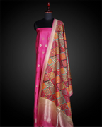 Close-up shot of the intricate woven motifs and gold zari border on a multicolour Banarasi silk dupatta.