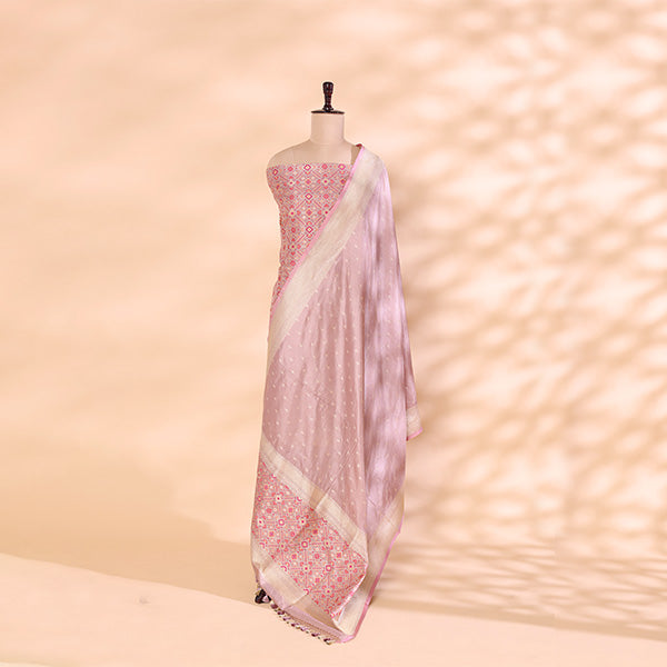 Close-up view of the intricate traditional patterns on the prismatic multicoloured Patola motif dupatta.
