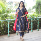 Full front view of a model in a Navy Blue Handwoven Banarasi Silk Suit with 3/4 sleeves, intricate gold zari patterns, and a red kora silk dupatta.