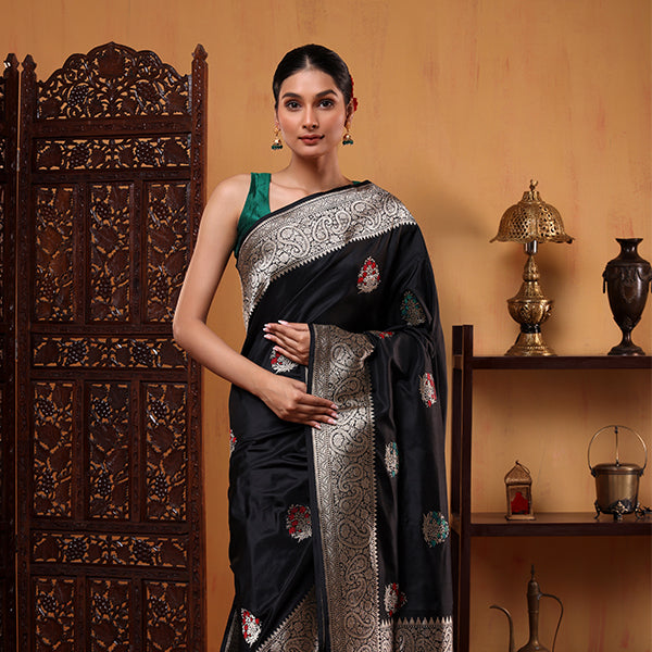 Front view of the handwoven Oceanic Elegance Katan silk saree showcasing its rich ocean blue body and intricate gold zari borders.