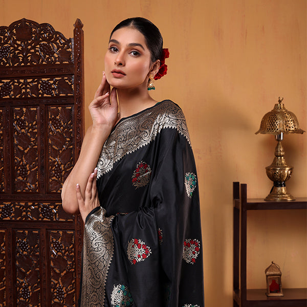 Unstitched un-dyed matching ocean blue Katan silk blouse piece featuring a coordinating decorative gold zari border.