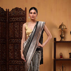 Unstitched 1-meter gold zari boota blouse piece featuring a premium matching silk border.