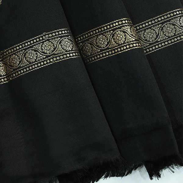 Full flat lay presentation of the 5.5-meter handwoven Onyx Majesty satin silk saree showcasing its entire length and borders.