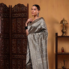 Unstitched 1-meter black and silver brocade silk blouse piece with a matching traditional golden zari border.