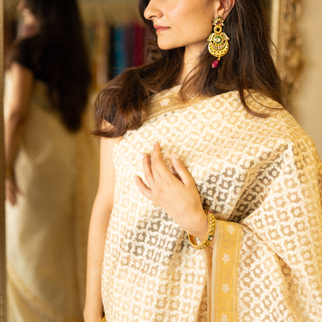 Organza Kora silk saree with detailed resham work and rich zari pallu with tassels
