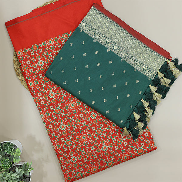 Close-up shot of the luxurious pure handloom Patola Banarasi silk fabric detailing the intricate gold base and fine Resham and Zari weaving.