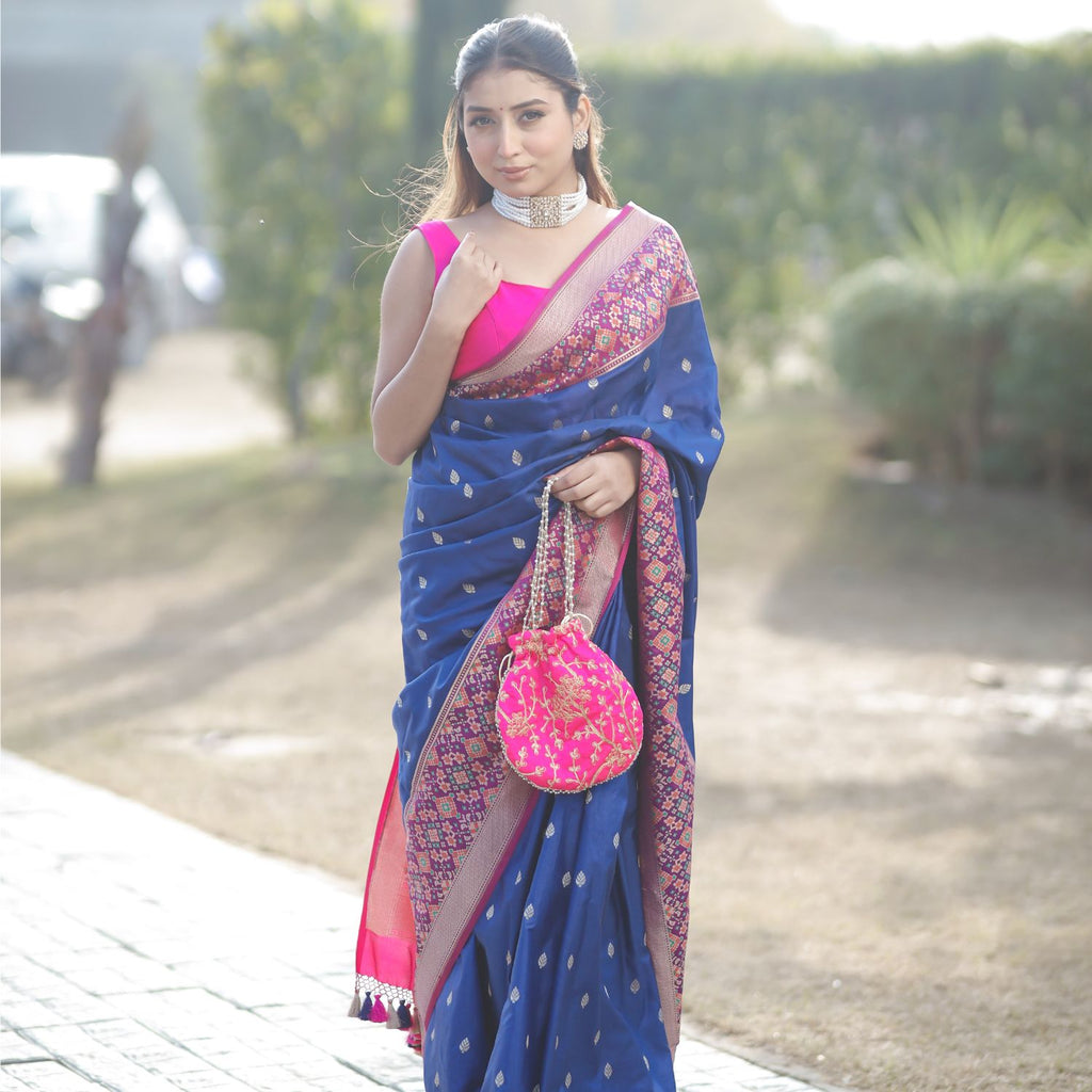Classic Patola silk saree with traditional style in royal blue and pink colors