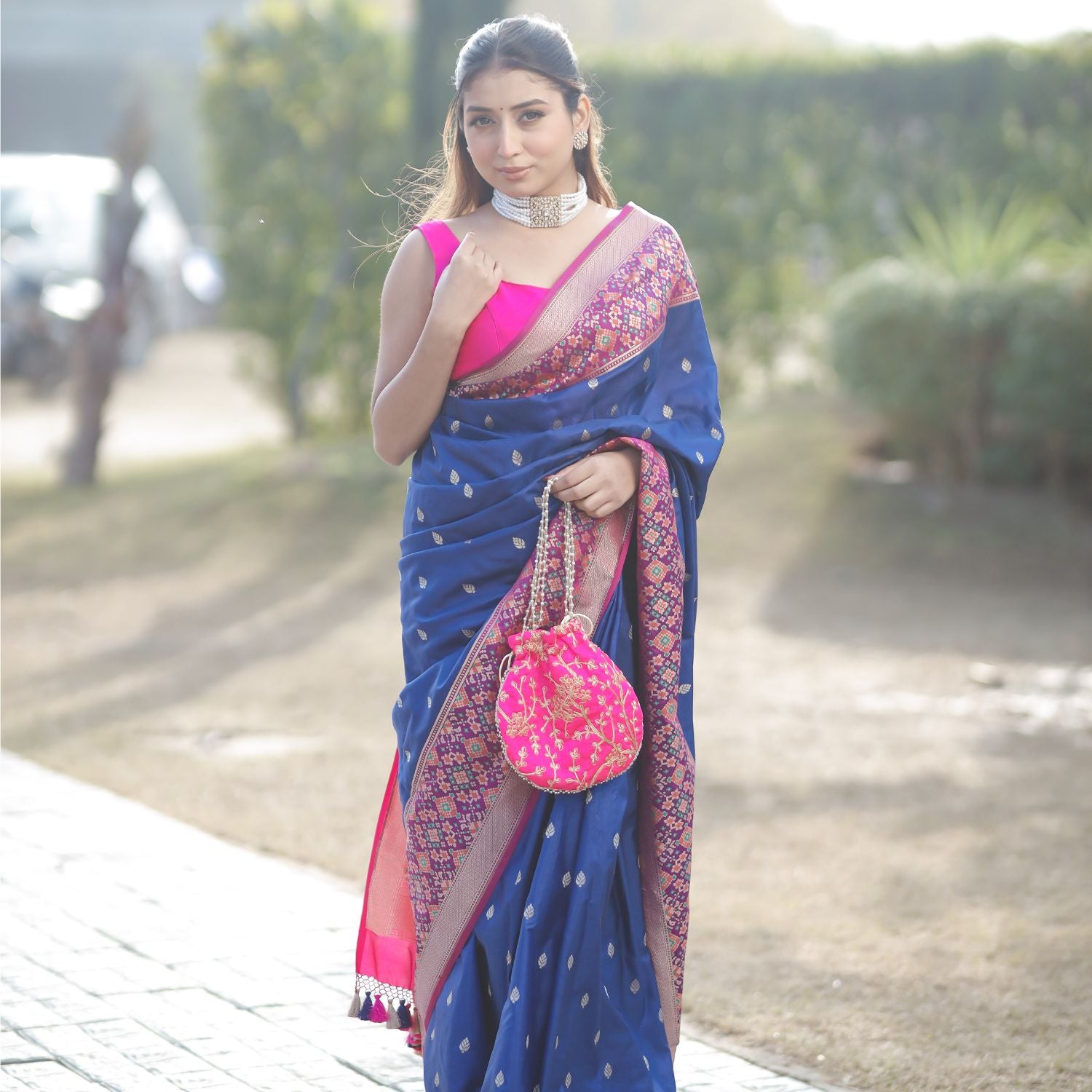Classic Patola silk saree with traditional style in royal blue and pink colors