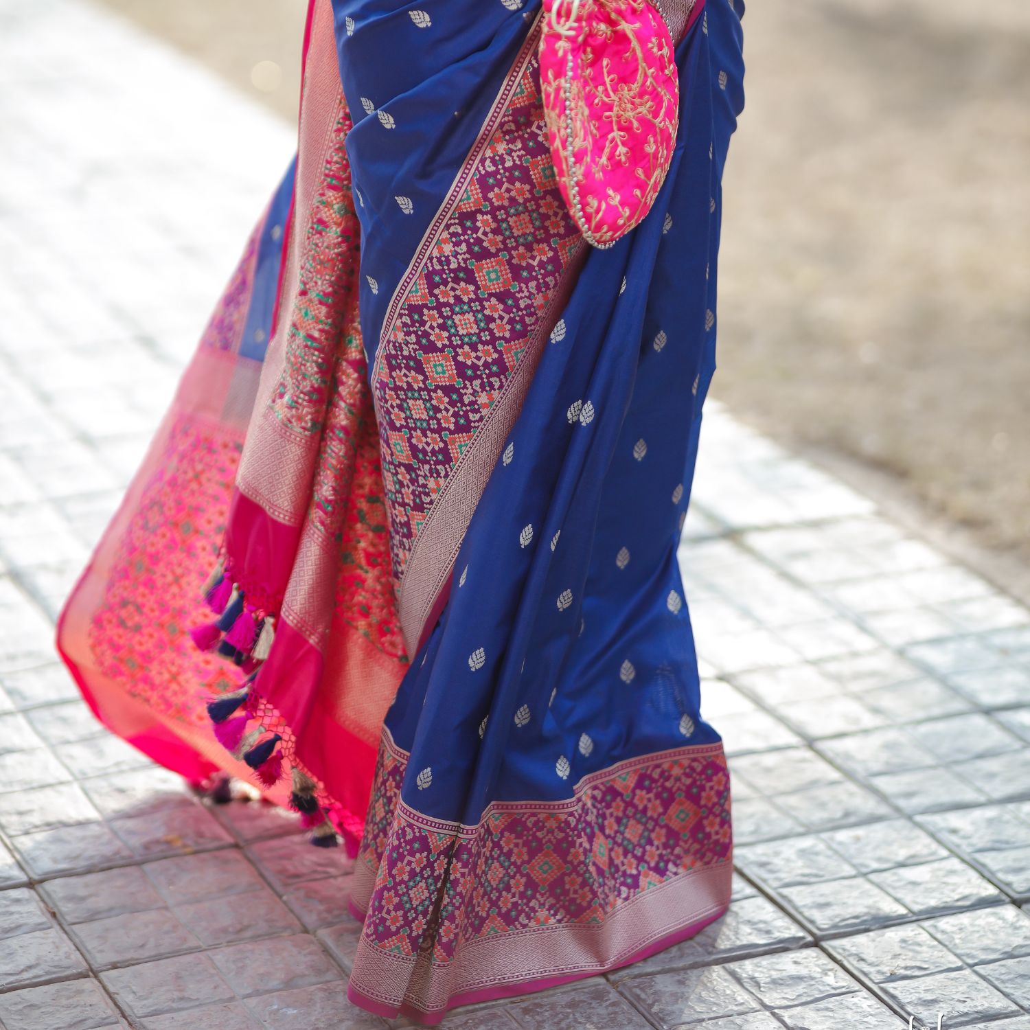 Patola silk saree with detailed weaving and smooth fabric for ethnic wear