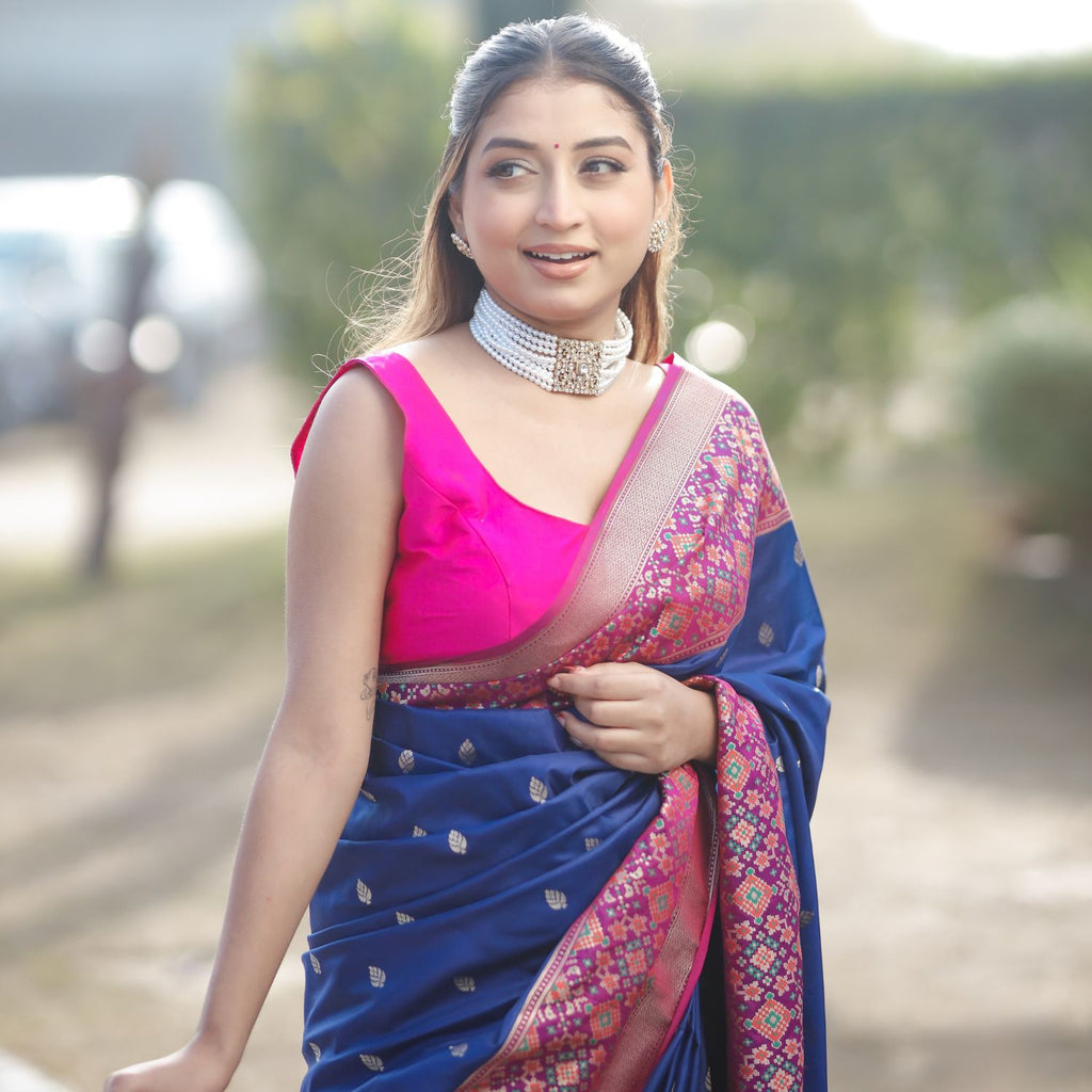 Patola silk saree with intricate woven pattern in blue and pink for festive occasions