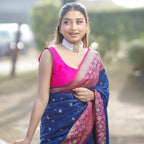 Patola silk saree with intricate woven pattern in blue and pink for festive occasions