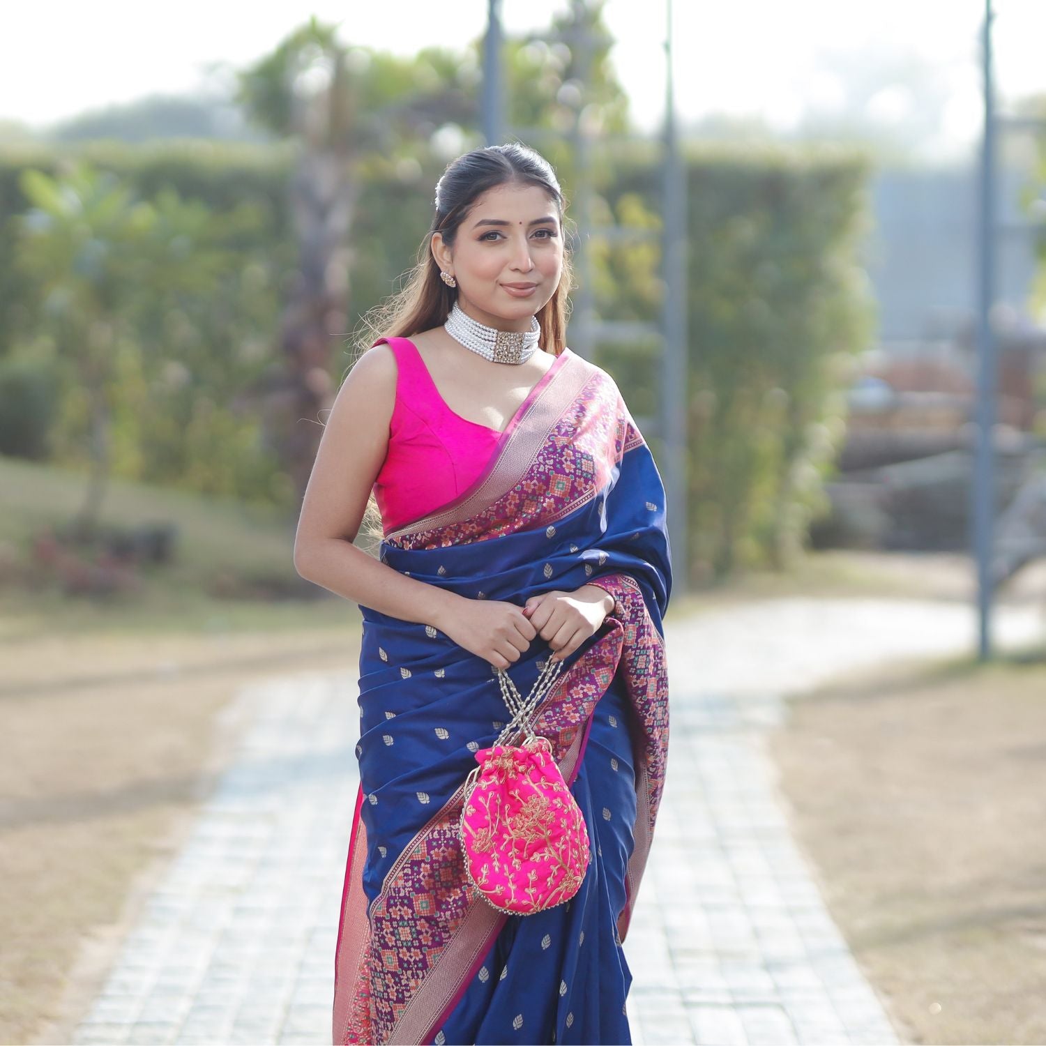 Patola silk saree in royal blue and pink with rich traditional pattern for women
