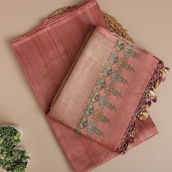 Close-up view of the premium handwoven Tussar silk fabric texture in petal blush pink, showcasing the genuine weave quality.