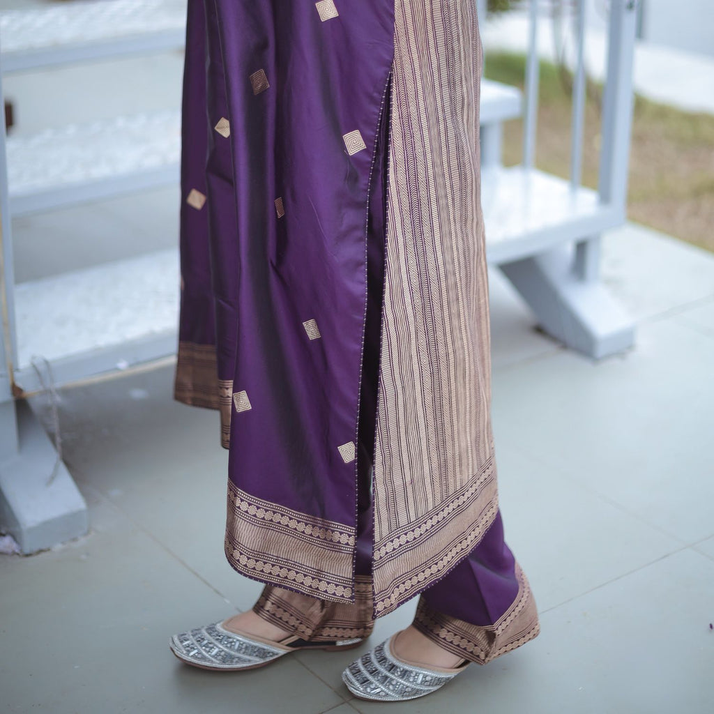 Premium Banarasi silk suit with smooth texture and ethnic design