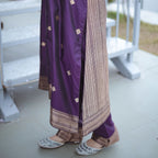 Premium Banarasi silk suit with smooth texture and ethnic design