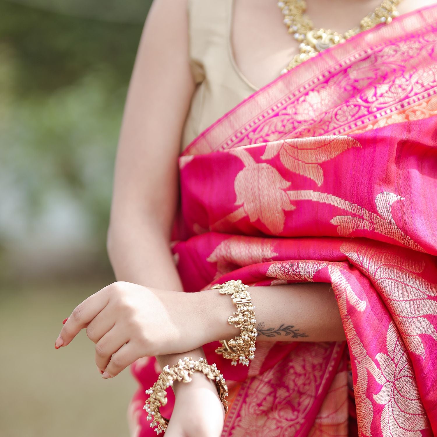 Premium katan saree with rich texture and jaal weaving for special occasions