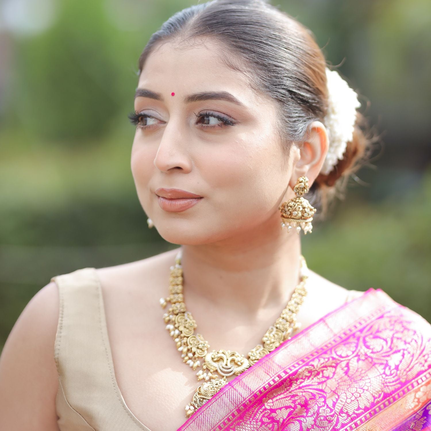 Premium katan silk saree with intricate jaal design for bridal and festive occasions