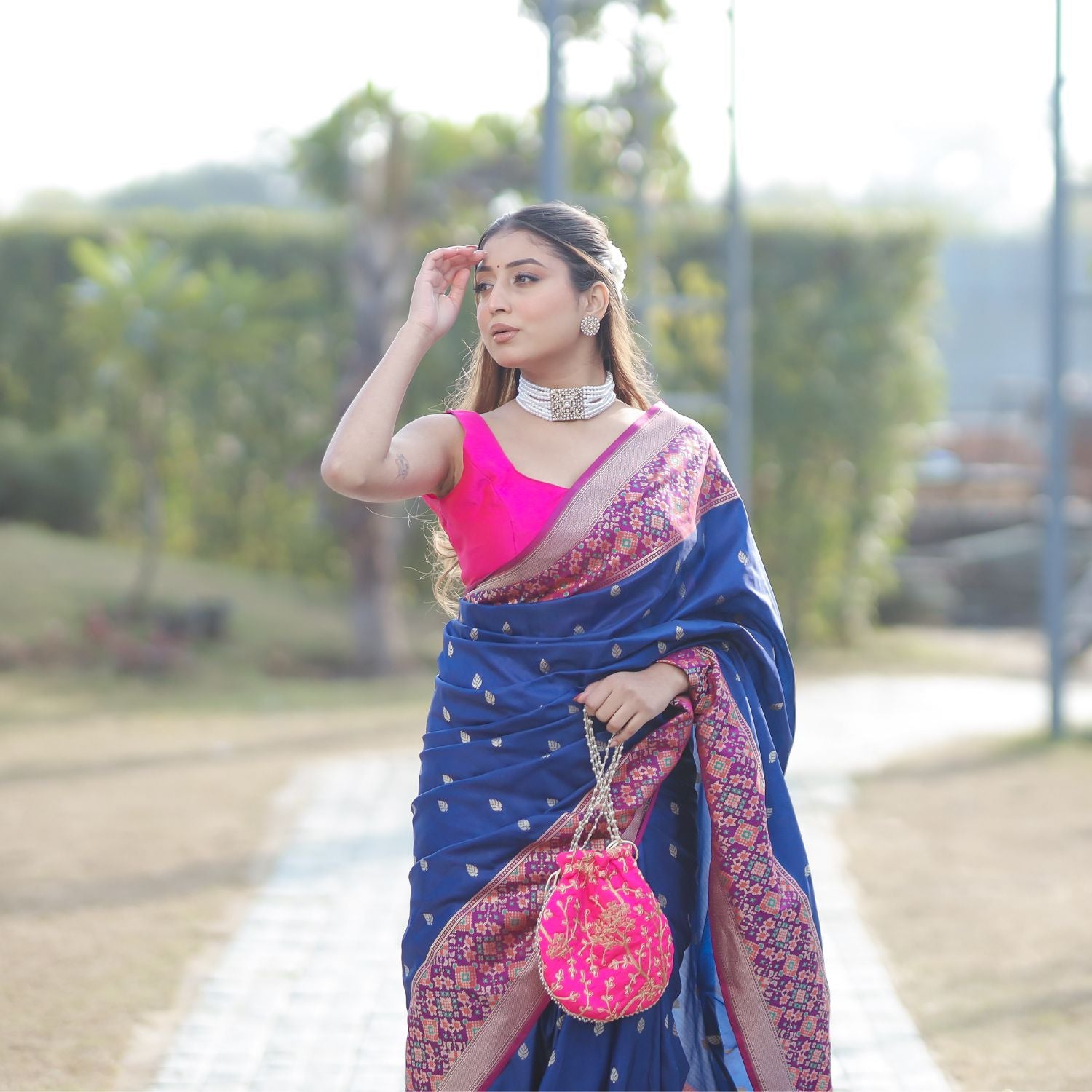 Premium Patola silk saree with elegant blue and pink color combination for festive wear