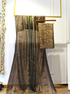 Unstitched Pure Boski Silk Olive Green suit draped on a mannequin displaying the intricate Kashmiri paisley dupatta and matching printed shirt fabric