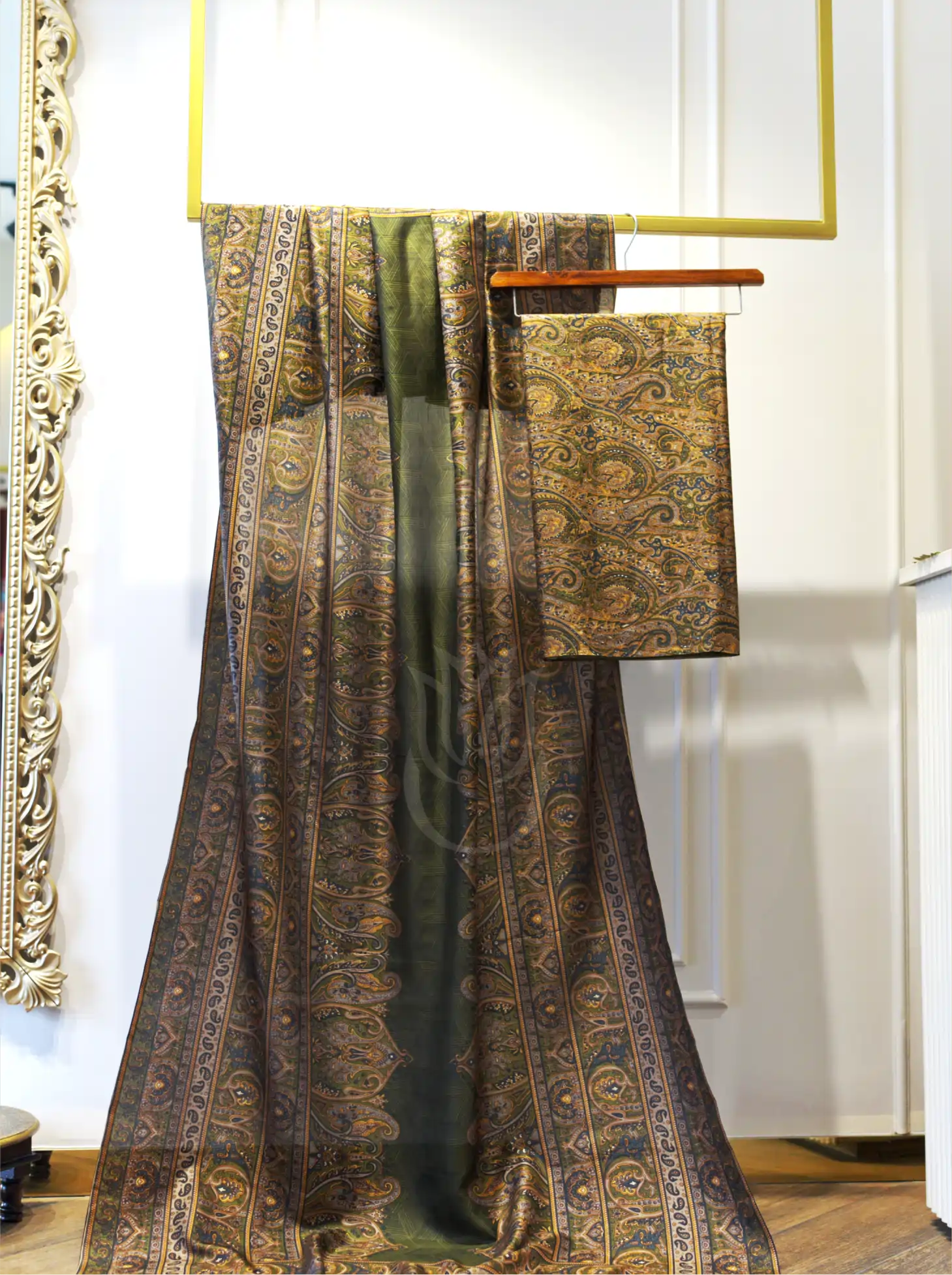 Unstitched Pure Boski Silk Olive Green suit draped on a mannequin displaying the intricate Kashmiri paisley dupatta and matching printed shirt fabric