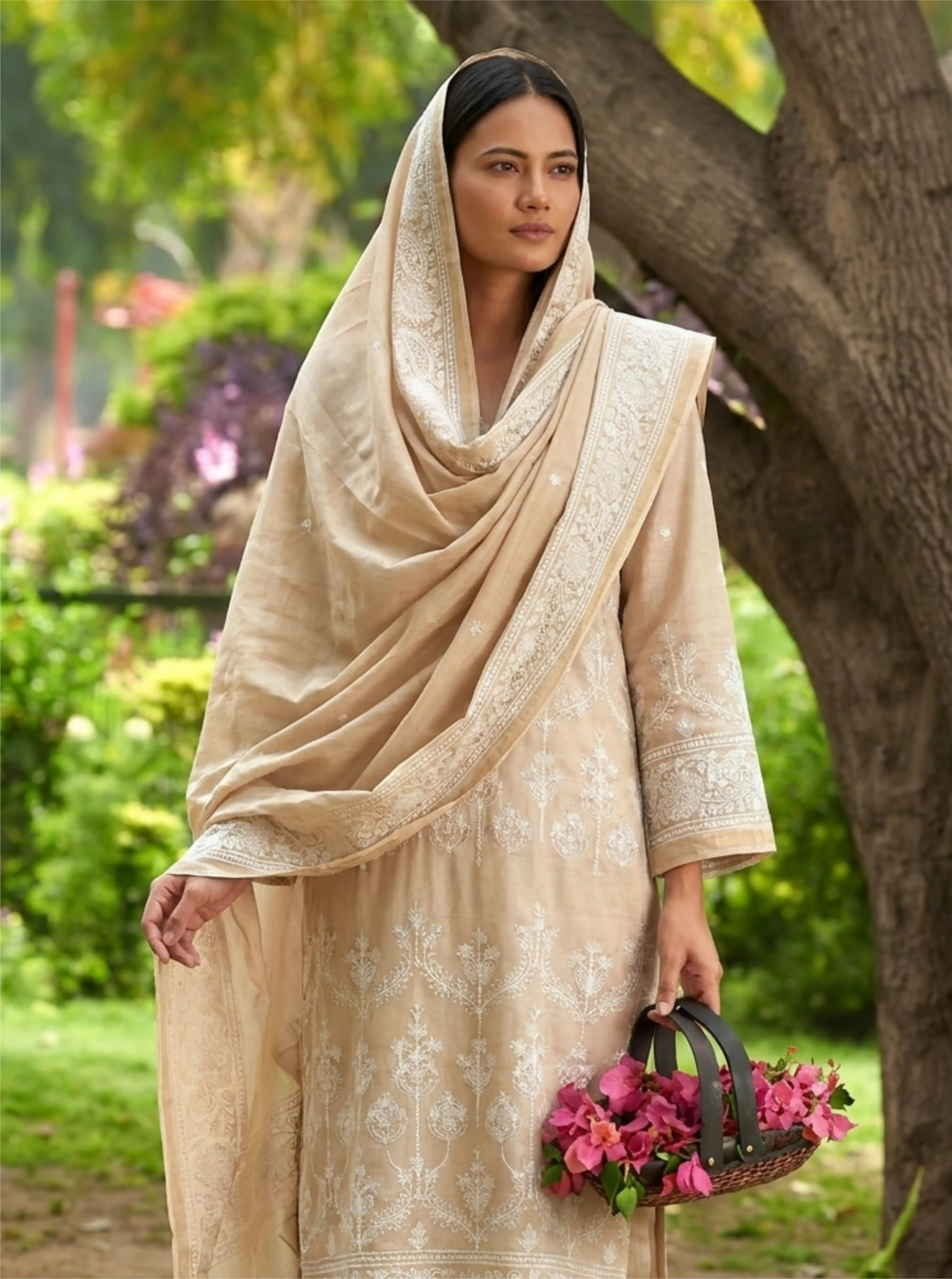 Detailed macro view of the premium lightweight and breathable Chanderi cotton silk fabric weave with elegant embroidered detailing.