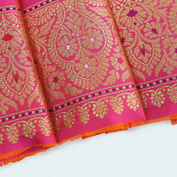 Macro shot of the rich texture and elegant drape of the twilight radiance pure katan silk festive saree.