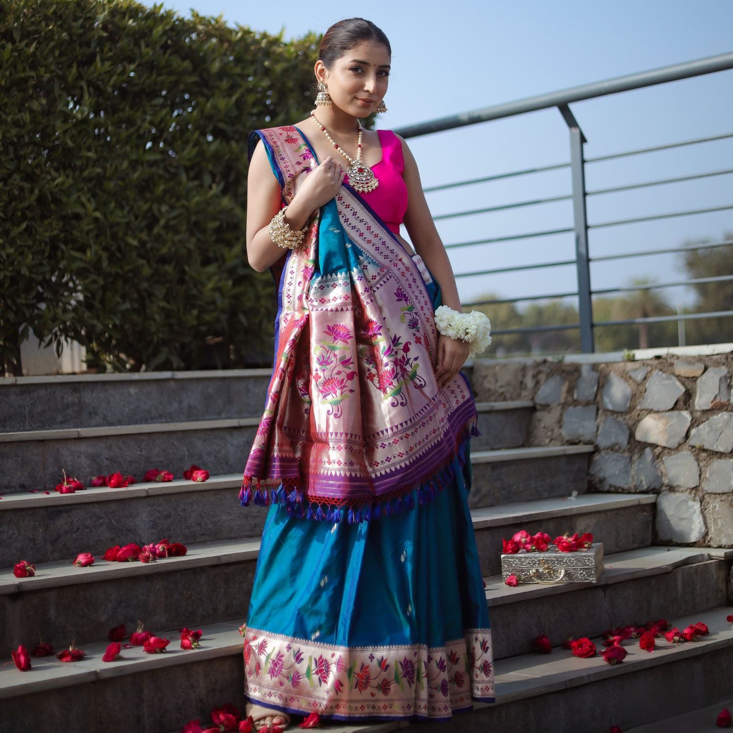 Pure Paithani katan silk saree in teal blue with floral gold border for wedding wear