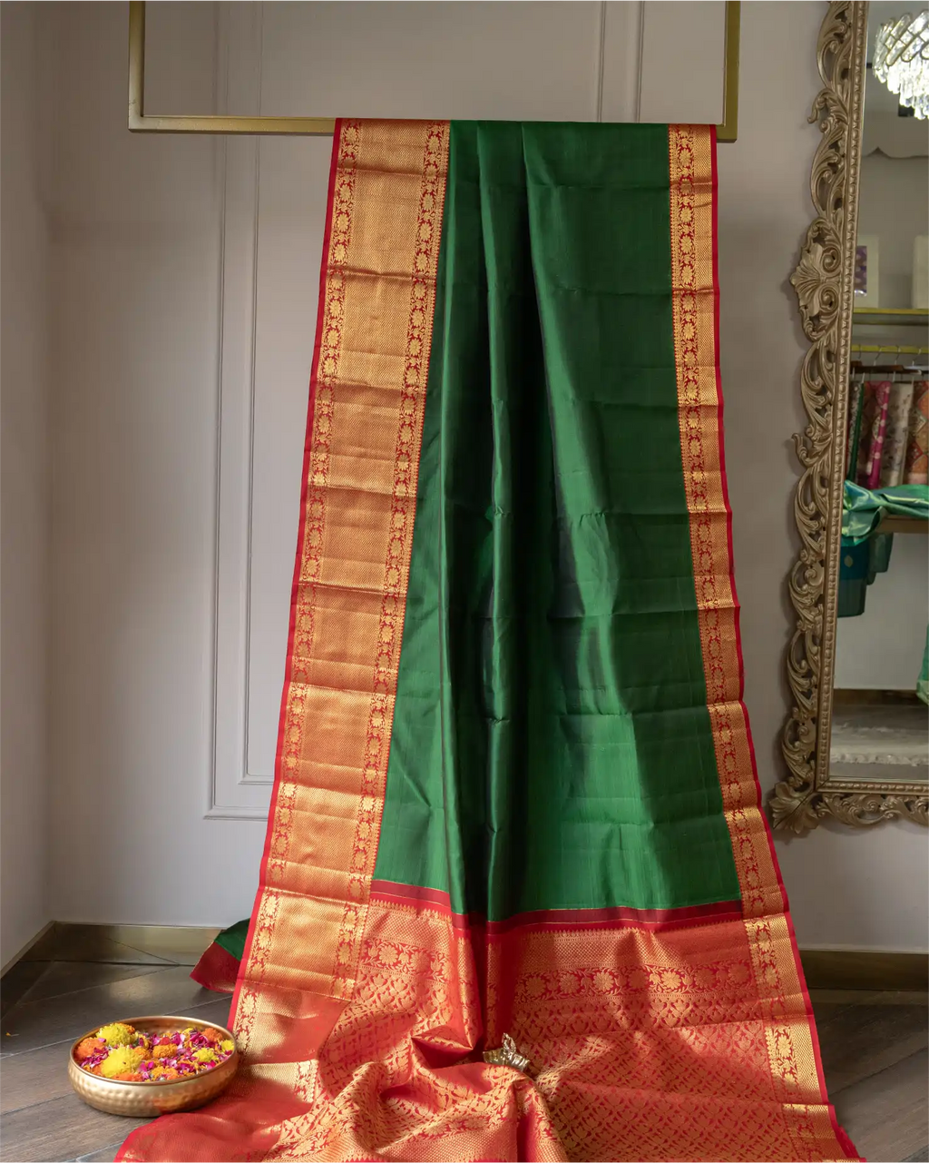 Detail view showing the luxurious natural sheen and texture of the pure silk emerald green fabric