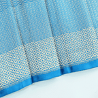 Macro shot of the authentic Banaras handloom pure tissue silk Jamdani fabric highlighting its fine sheen and metallic weave texture.