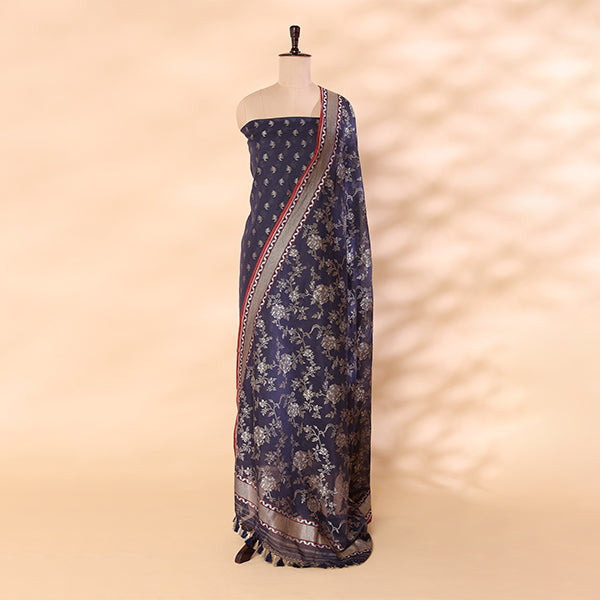 Detailed shot of the radiant prismatic multicoloured dupatta highlighting the intricate traditional handloom floral weaving craftsmanship.