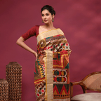 Close-up view of the unstitched Tussar silk blouse piece featuring stripes and a traditional Kantha border.