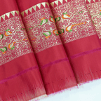 Close-up view of the 1-meter unstitched crimson silk blouse fabric piece featuring a matching traditional Meenakari border.