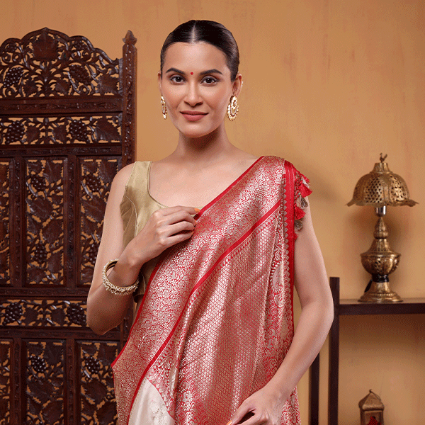 Rear view of the handwoven Banarasi silk saree highlighting the luxurious, heavy golden zari pallu and the elegant traditional border design.