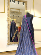 Royal blue handwoven Kora Katan silk unstitched suit fabric with gold bootis, displayed on a mannequin alongside a matching metallic gold-striped dupatta with pink edging.