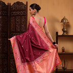 Full-length view of the elegant royal orchid silk saree, showcasing the cross-color detailing and the premium drape of the handwoven Paithani border