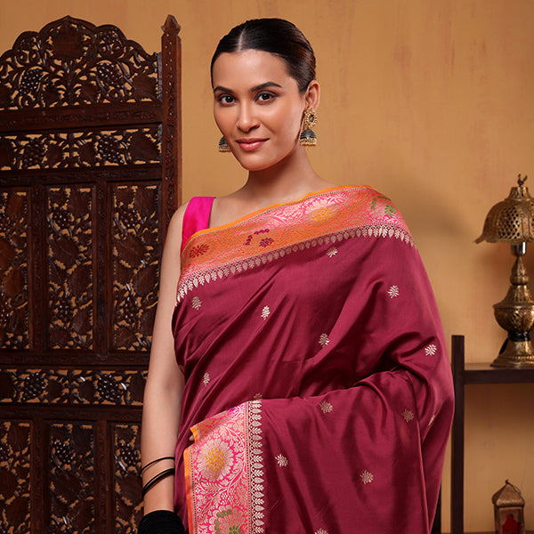A beautiful display of the rich, heavy handwoven Paithani pallu on the royal orchid Katan silk saree.