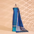 Premium handwoven Satin Silk unstitched suit in a tranquil blue shade displayed on a mannequin, featuring intricate silver resham strips and a matching silver border dupatta.