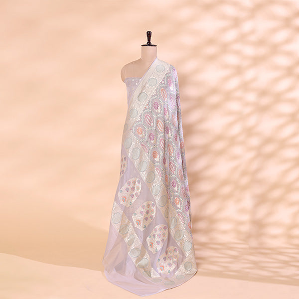 Pure handwoven Georgette Silk unstitched suit in a refined grey shade displayed on a mannequin, featuring intricate Meena and Resham work paired with a vibrant multicolored dupatta.