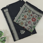 Flat lay presentation of the complete unstitched premium luxury suit set, including the slate blue handwoven Patola silk kurta fabric and festive golden dupatta.