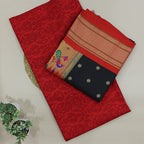 Close-up view of the premium strawberry blush pure Banarasi silk dress material, showcasing the traditional handwoven booti patterns.